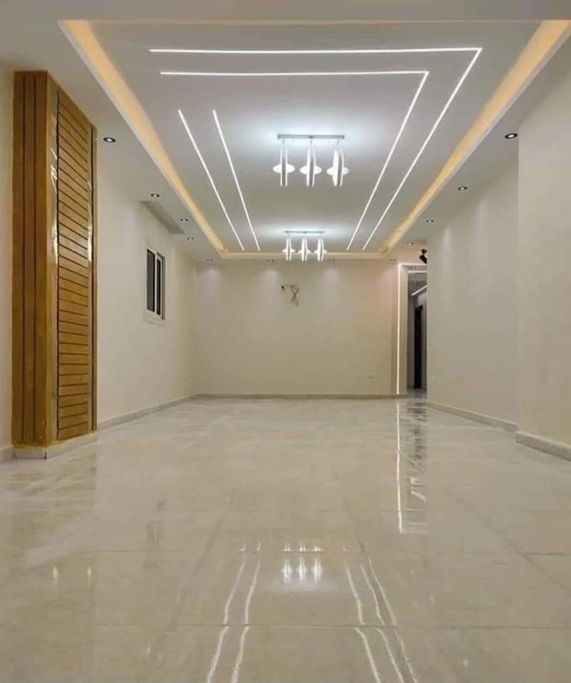 Pristine White Neon and Bright Living Room False Ceiling Design